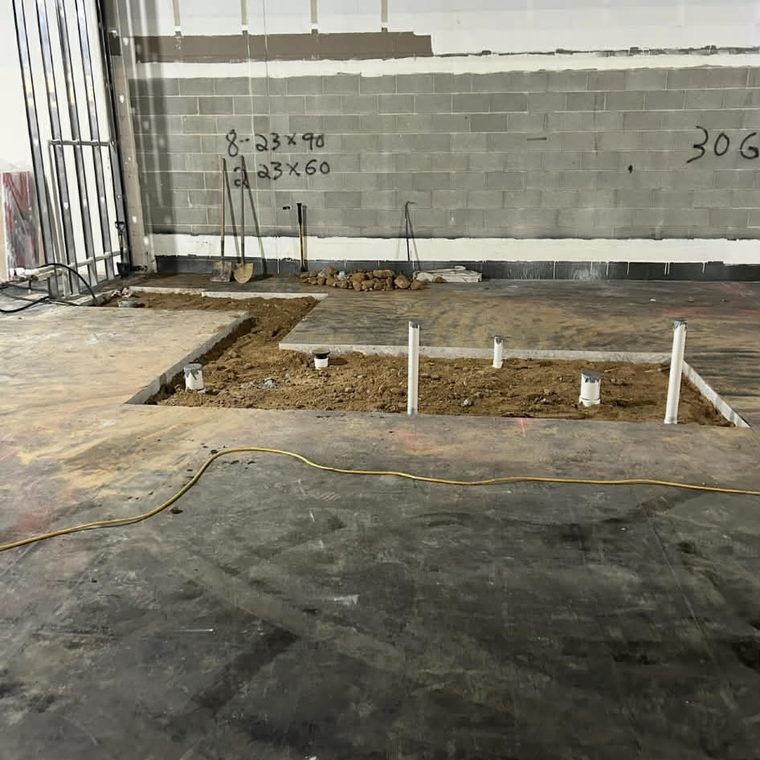 Under-slab plumbing rough-in on a new construction project by KW Plumbing
