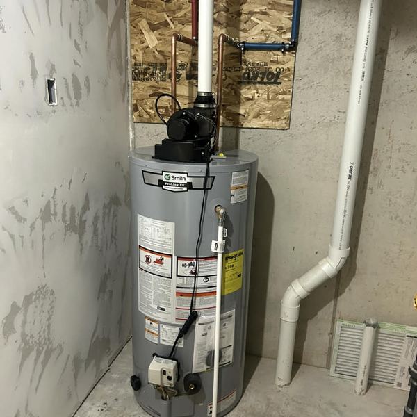 Power vent gas water heater installation by KW Plumbing